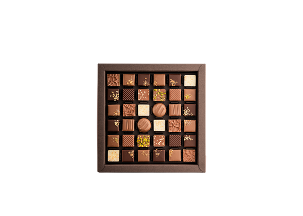 Boîte de 36 chocolats pralinés Favarger, assortiment de chocolats suisses aux pralinés, élaborés à Genève. 