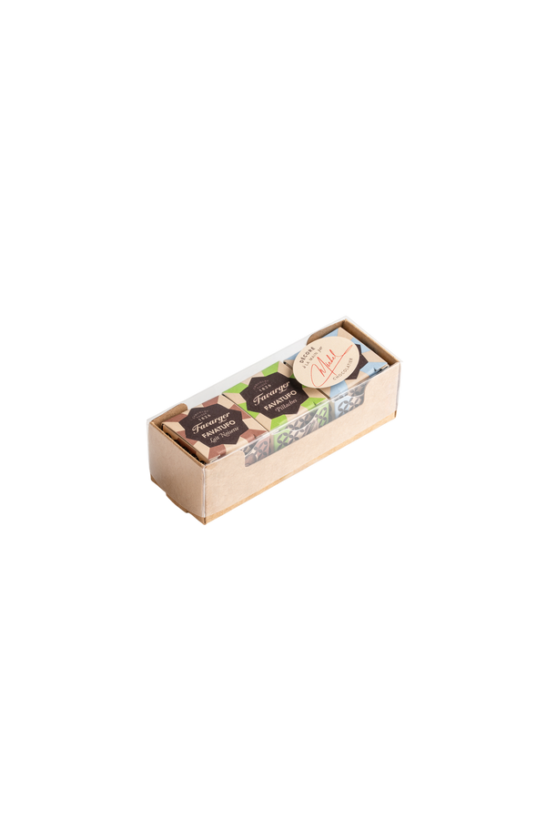 Coffret Favatufi Favarger, assortiment de trois truffes au chocolat suisse inspirées du savoir-faire suisse et italien.