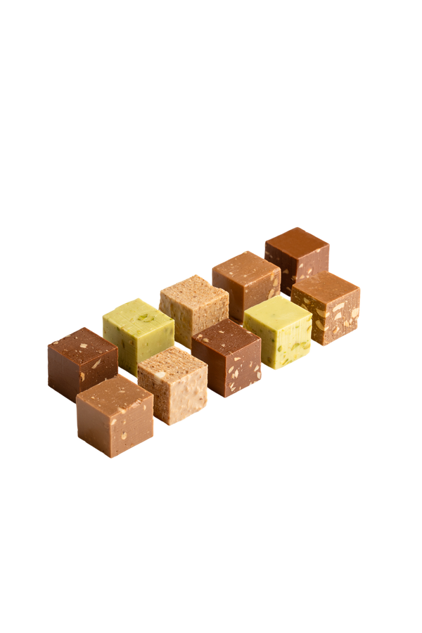 Réglette de 10 Favatufi Favarger, assortiment de truffes au chocolat suisse aux saveurs noisette, amande, pistache et noix de coco.
